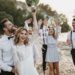 people celebrating wedding beach