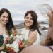 Bride and bridemaids on the beach